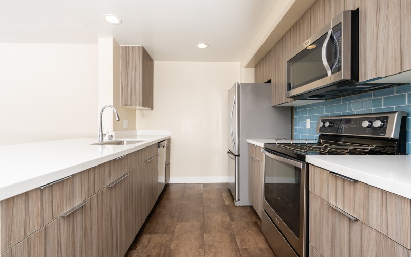 a kitchen with a sink and a table