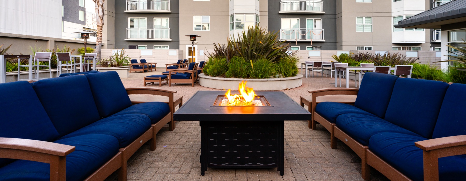 fireplace with couch seating