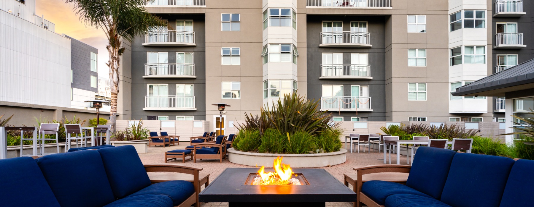 Couches surrounding a fire pit